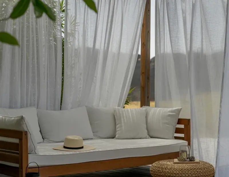 Budget-Friendly Patio Daybed Setup with Sheer Curtains | Cozy Outdoor Seating Ideas